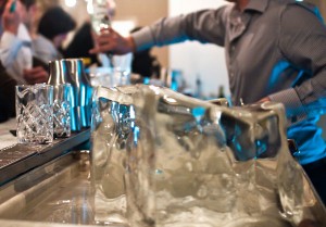 An ice block carved into spheres for designer cocktails